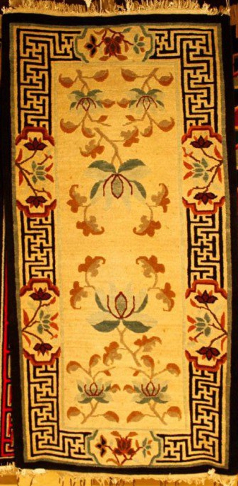 Tibetan carpet with lotus and border